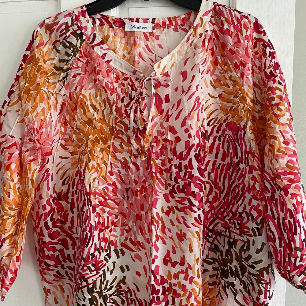 CALVIN KLEIN 100% silk multi-colored blouse.